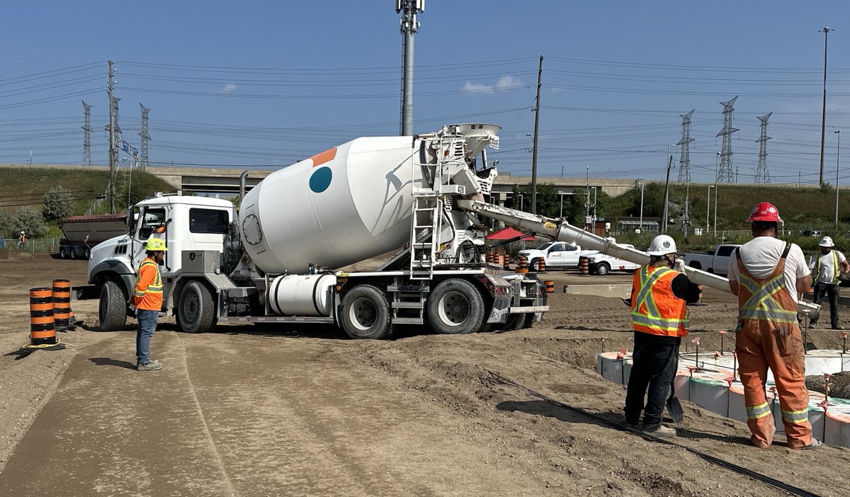 YongeSubwayEXT's tweet photo. Excavators move soil and mixer trucks pour concrete foundations at the future tunnel boring machine launch shaft site. 👷

This work helps get the ground ready for the deep concrete supports that will form the walls of the shaft.

More about tunnel boring: https://t.co/HgDlUwoqPY https://t.co/faYlPXJJGT