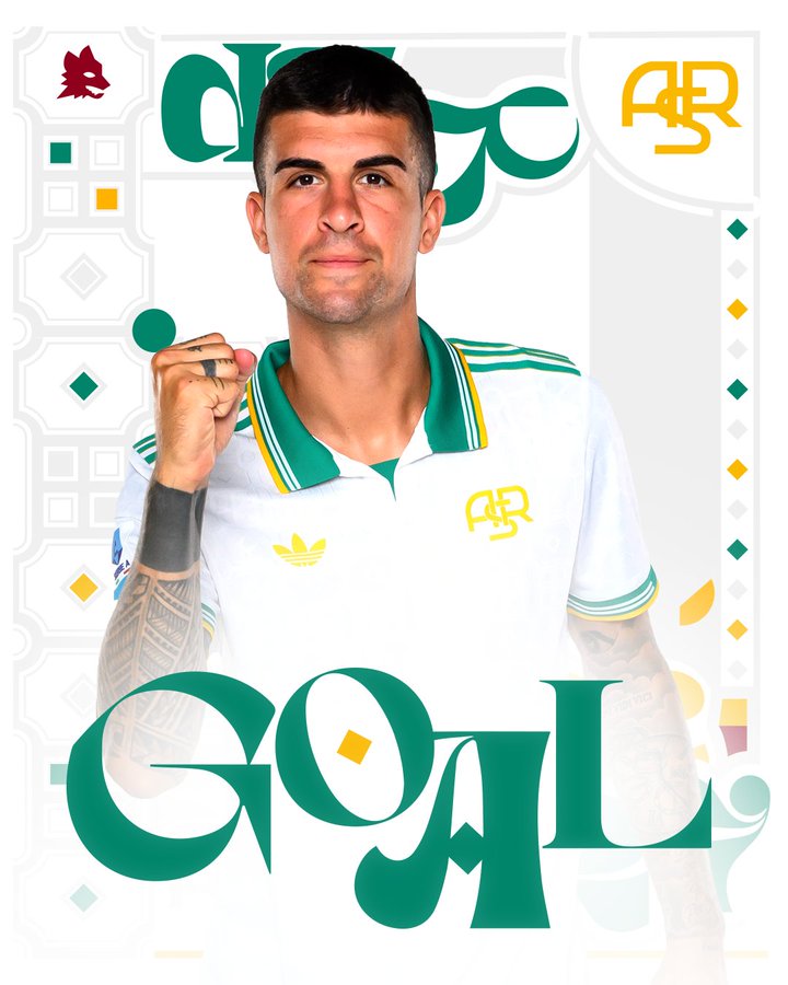 Gianluca Mancini wearing a white AS Roma jersey with green and yellow accents, raising a fist. The jersey has the AS Roma logo. Large green text reading "GOAL" is overlaid on the image.