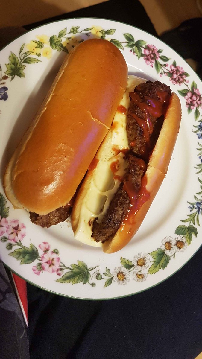 Just for all you telling me to GO EAT- i made due with what i had. Burger n' cheese in hotdog buns!