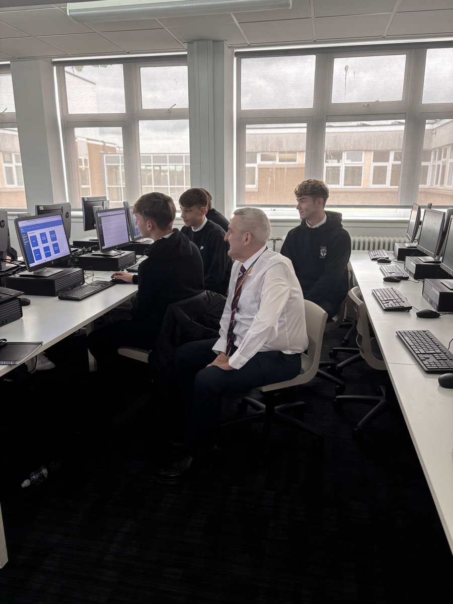 Some of our senior pupils, who will be leading the development of the new school website, having planning discussions with Mr Swan. <a href="/KAICTBusiness/">KilwAcad ICTBusiness</a> <a href="/Kilwinning_Acad/">Kilwinning Academy</a>