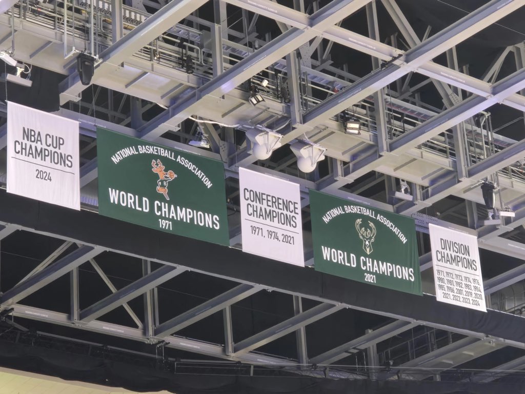 ReidHolben's tweet photo. @shawn_depaz @PeteBlackburn Bucks are an elite example of using  appropriate old logo on banners https://t.co/p4SNERK7xS