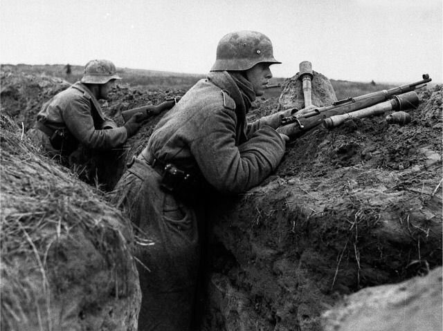 24 September 1942

A brief lull. Both sides too battered to move. We used the quiet to scavenge: canteens, helmets, even boots from the fallen.

Our trench was little more than a scrape in the dirt, filled with mud and blood. We reinforced it with sandbags, debris, even corpses -