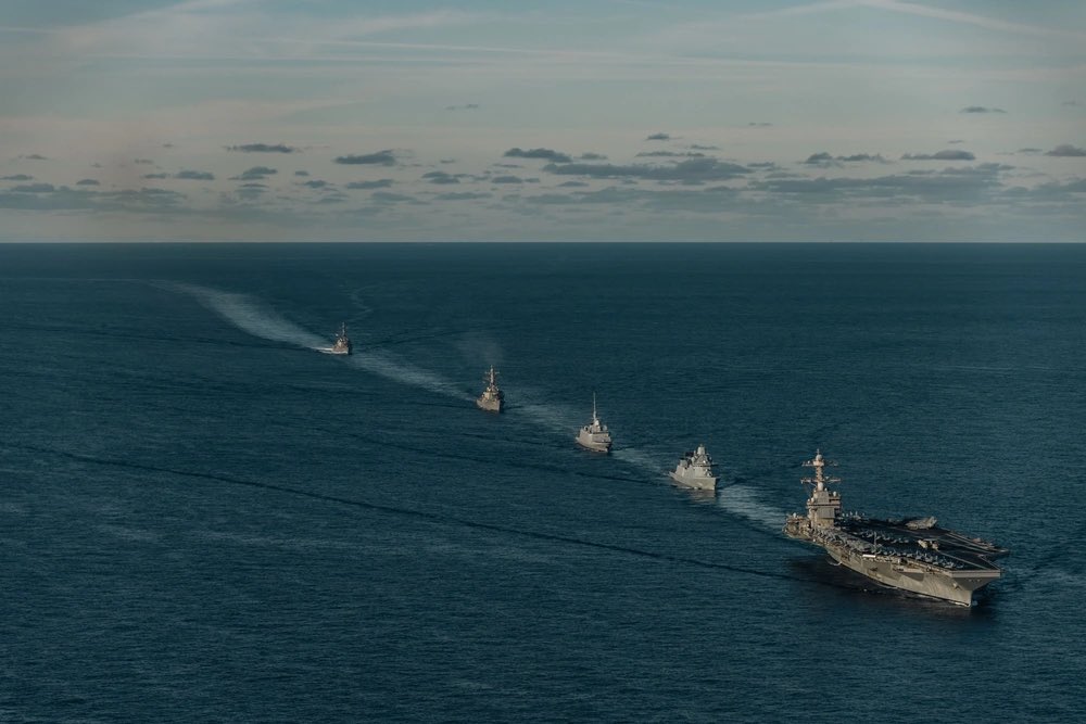 The USS Gerald R. Ford (CVN-78) and her Carrier Strike Group, consisting of the Arleigh Burke-Class Guided-Missile Destroyers, USS Mahan (DDG-72) and USS Winston S. Churchill (DDG-81), alongside the Royal Danish Navy Iver Huitfeldt-Class Frigate, Niels Jeul (F363), and the French