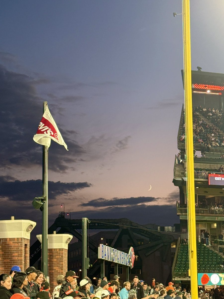 Waxing crescent evening at the ballpark. 🧡🖤🌉