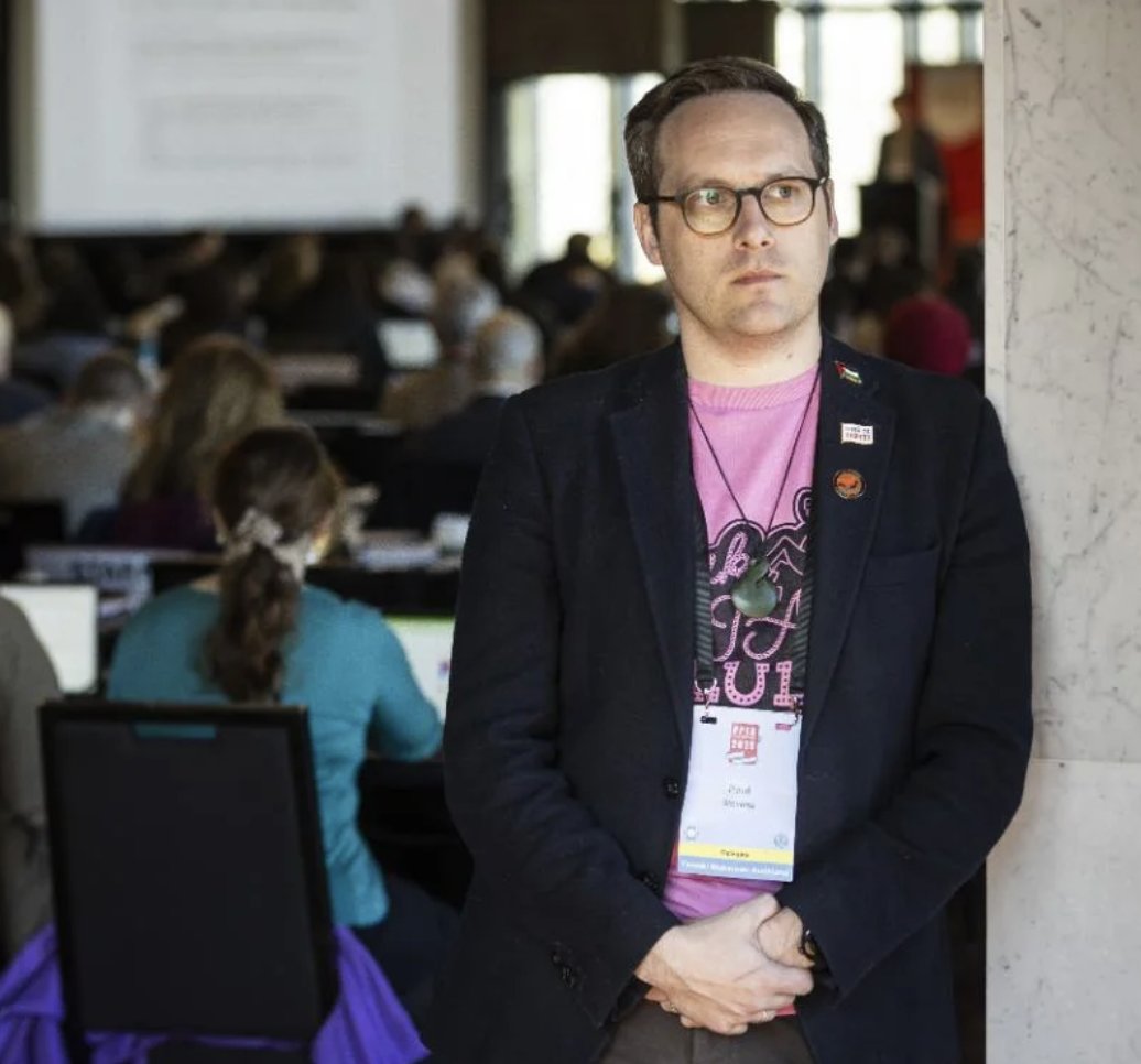 tonesdot's tweet image. this is the ppta guy complaining about 'trump boys' and 'toxic masculinity' among high school students. he's wearing palestine flag and toitu te tiriti badges. he's not a teacher, he's an activist who doesn't like views that don't match his own