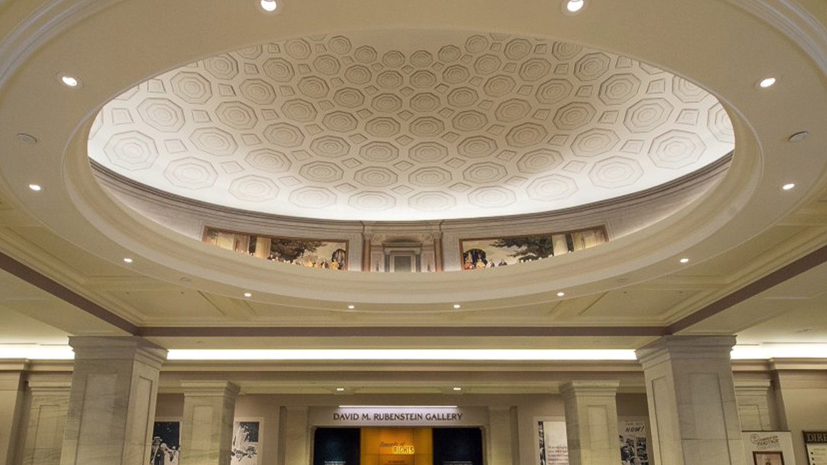 We worked at the US National Archives to design &amp; implement illusionary artwork in the visitor orientation plaza. This mural was meant to simulate the upper portions of the display entablature in the Rotunda for the Charters of Freedom.

#CustomMural