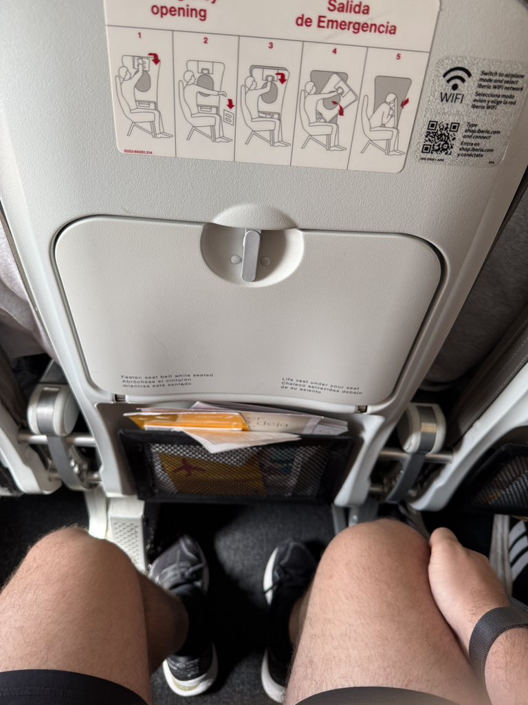 When you are flying economic never pay for seat selection, you will be placed in the emergency exit row which has plenty of leg room