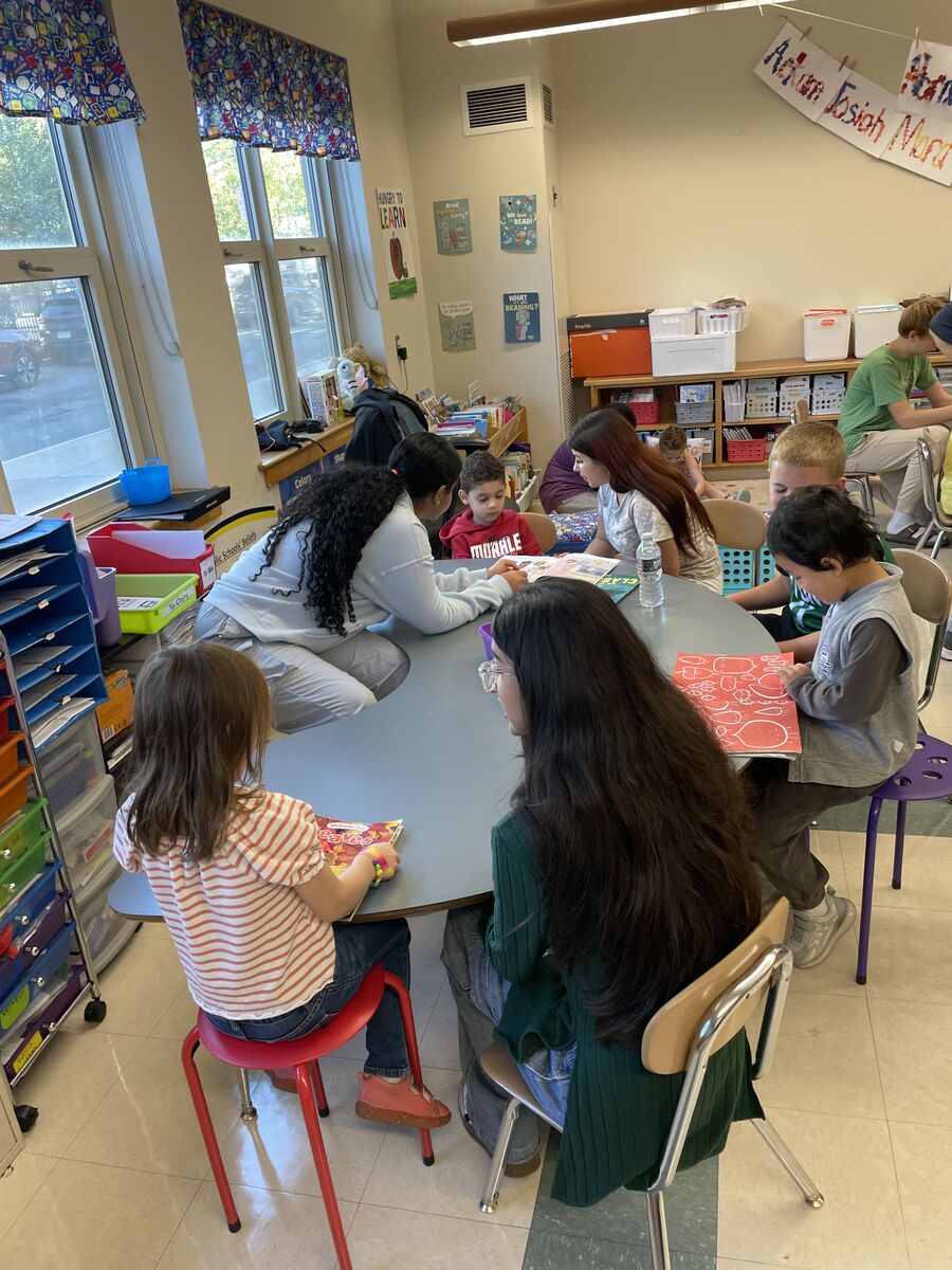 Malden_Schools's tweet image. At Forestdale, Kindergartners met with their 8th grade buddies to read books together!