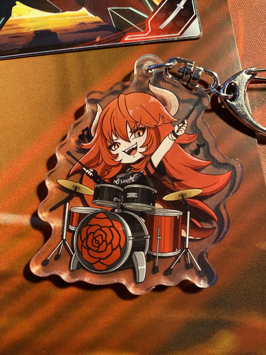 WOO Look what i got in the mail today! 
The poster and the metal card look so cool, the pose with the explosion on the background is so badass! I really like the keychain, it is so cute! ❤️‍🔥 #zentreya