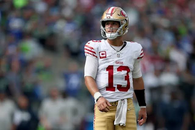 49ersSportsTalk's tweet image. #49ers GM John Lynch on KNBR gives an exciting update on QB Brock Purdy’s progress:

“He really looked really good (at Wednesday’s practice). We’ll see how he responds today… His progression has been really a good one.” #FTTB
