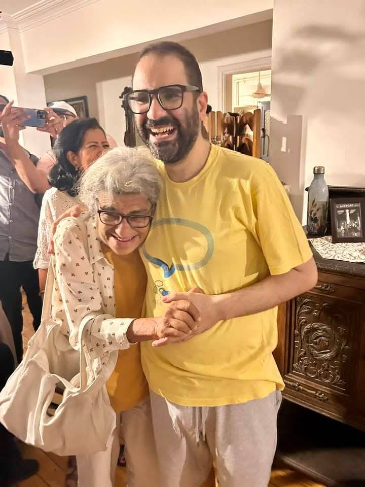 Wonderful to see British-Egyptian writer Alaa Abd El-Fattah home in Cairo with his sister Sanaa Seif &amp; mother Laila Soueif, after enduring hunger strikes &amp; years of prison for defending human rights. <a href="/GulfCentre4HR/">GCHR</a> sends its joy to the family that @Alaa is finally free! #FreeAlaa