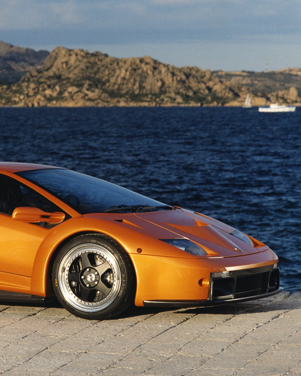 Lamborghini's tweet photo. For 35 years today, the name Diablo has been synonymous with extreme performance. With its visionary design and a V12 engine able to reach 325 km/h, it's easy to understand how it managed to shape its generation and become an instant icon. https://t.co/SbcmMRQFWv
