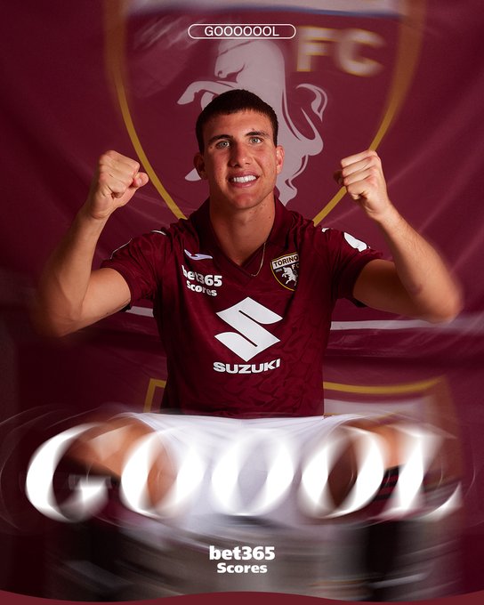 Cesare Casadei wearing a maroon Torino FC jersey with a Suzuki logo and a lion emblem. He is posing with raised fists in a celebratory gesture. A maroon banner with the Torino FC logo is in the background. The text "GOOOOOOOOL" and "bet365 Scores" is overlaid at the bottom.