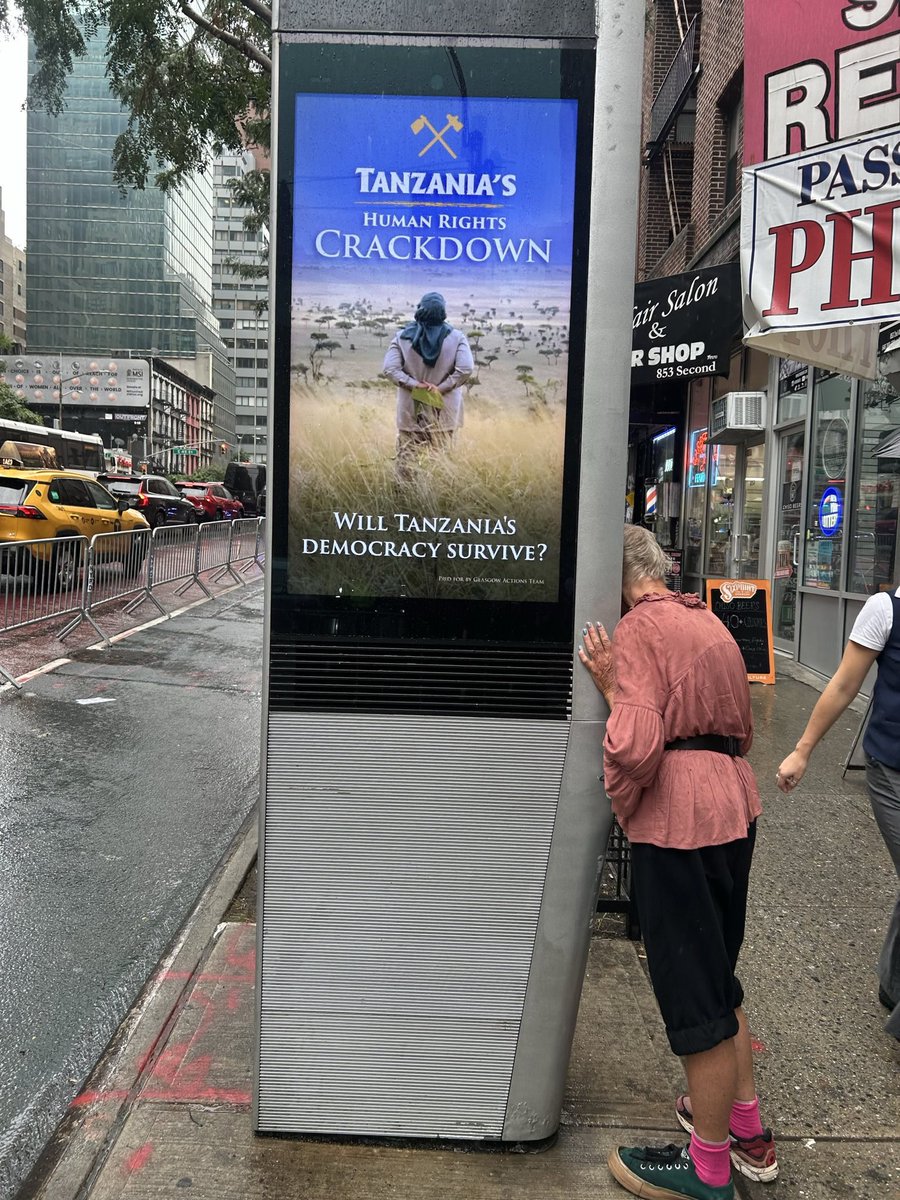 Liberatus80's tweet photo. In New York, President @SuluhuSamia is trending on billboards— but the fame comes from silencing democracy, not building it.

#FreeTunduLissu #NoReformsNoElection https://t.co/HIppCqHZBc