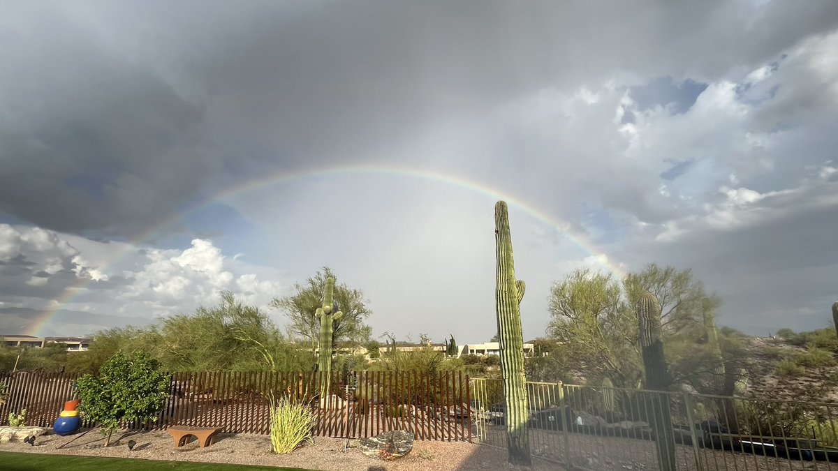 PCKnappenberger's tweet photo. That last downpour had some pea-sized hail mixed in. Left this beautiful rainbow in its wake! #azwx @whatsuptucson @NWSTucson https://t.co/LczWE6jVMR