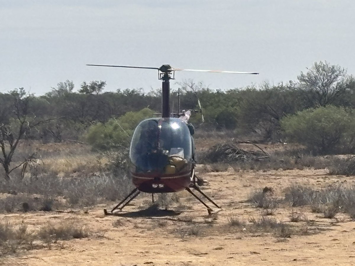 Mustering pilot stopping for smoko at Minilya Roadhouse.