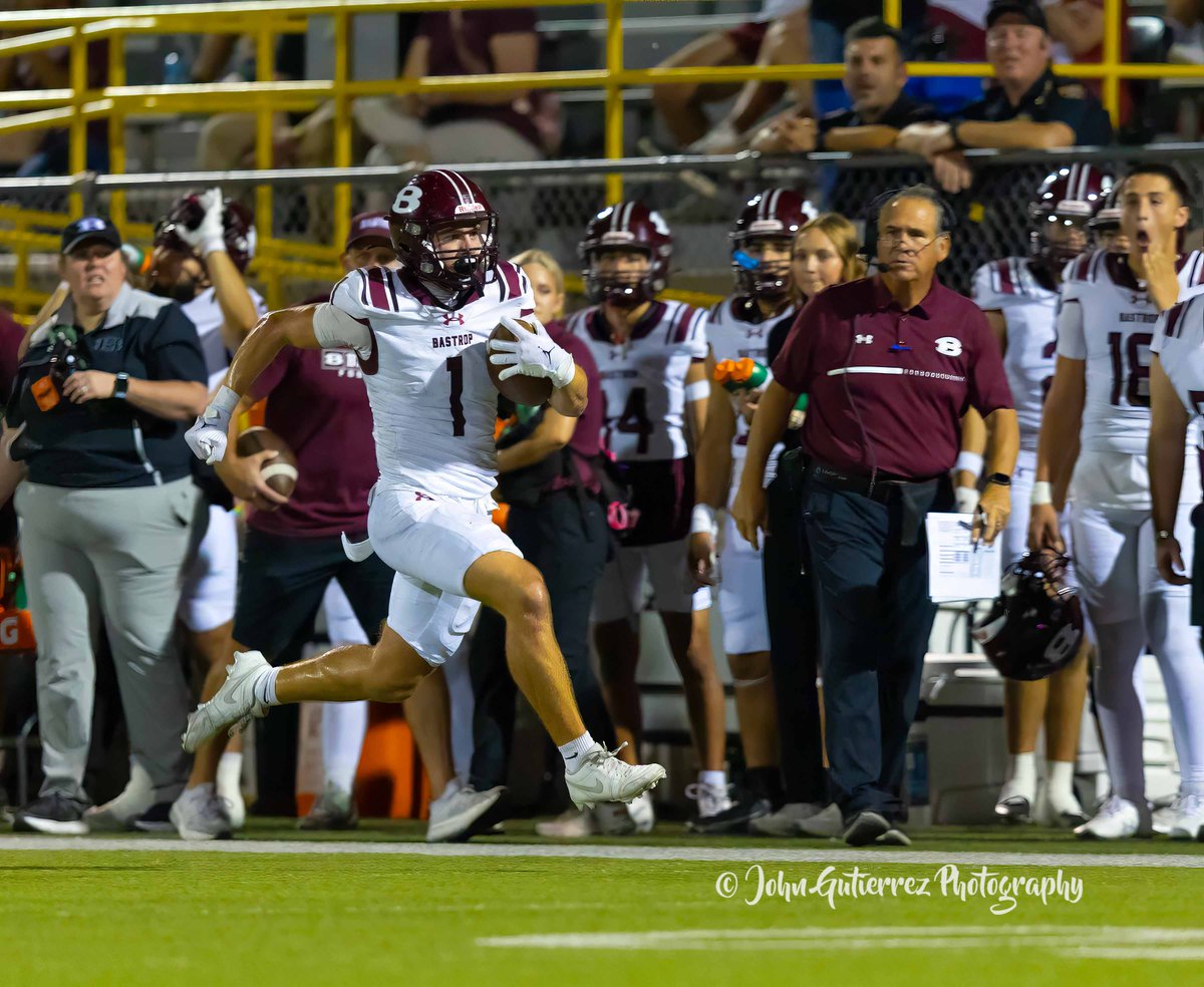 The Bastrop Bears overwhelmed the McCallum Knights with a relentless offensive stampede, sealing a lopsided 69-7 victory. Touchdown after touchdown, the Bears proved unstoppable, leaving the Knights scrambling to contain the surge. In the image, Bears wide receiver Dallas