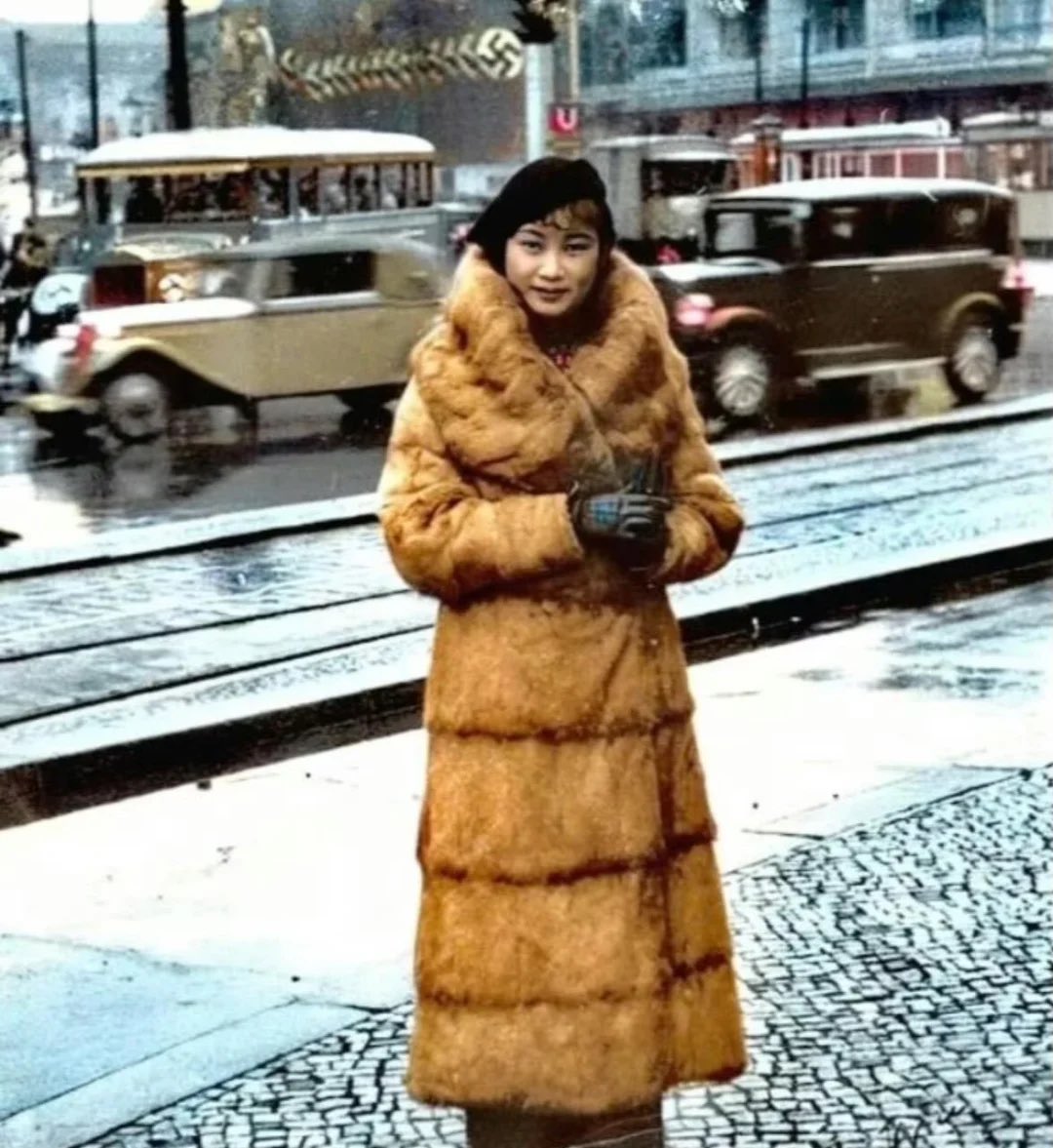 Hu Die胡蝶, also known as Butterfly Wu, in Berlin, 1935. 

She was a popular Chinese actress from Shanghai during the 1920s and 1930s, and was voted China's first "Movie Queen"  in 1933.