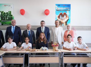 Students in white shirts and black pants holding Turkish flags, standing with a man in a suit. A large banner reads "Dr. Necip Öztürk Ortaokulu Açılış Töreni 28 Eylül 2023 / Adıyaman." A man in a suit speaks at a podium with microphones, flanked by Turkish flags and a banner featuring a portrait. People in suits and children sit at desks with flowers and balloons. Individuals in suits sit around a table in a meeting room.