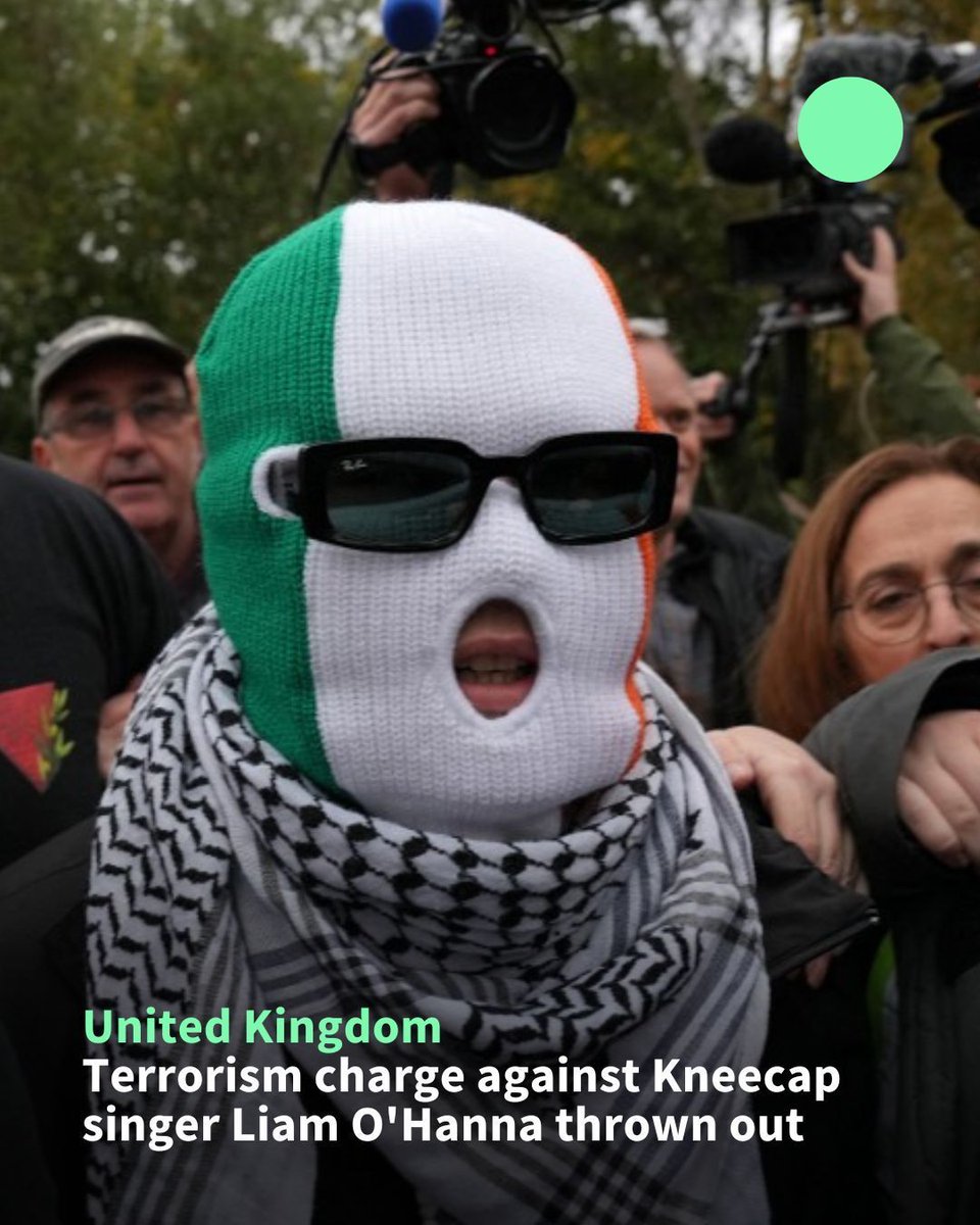 A UK court has thrown out a terrorism charge against a Northern Irish singer from the punk rap group Kneecap which had provoked an outcry among their fans.
 
Cheers erupted from supporters Friday as the judge found there had been a technical error in the case against Liam O'Hanna