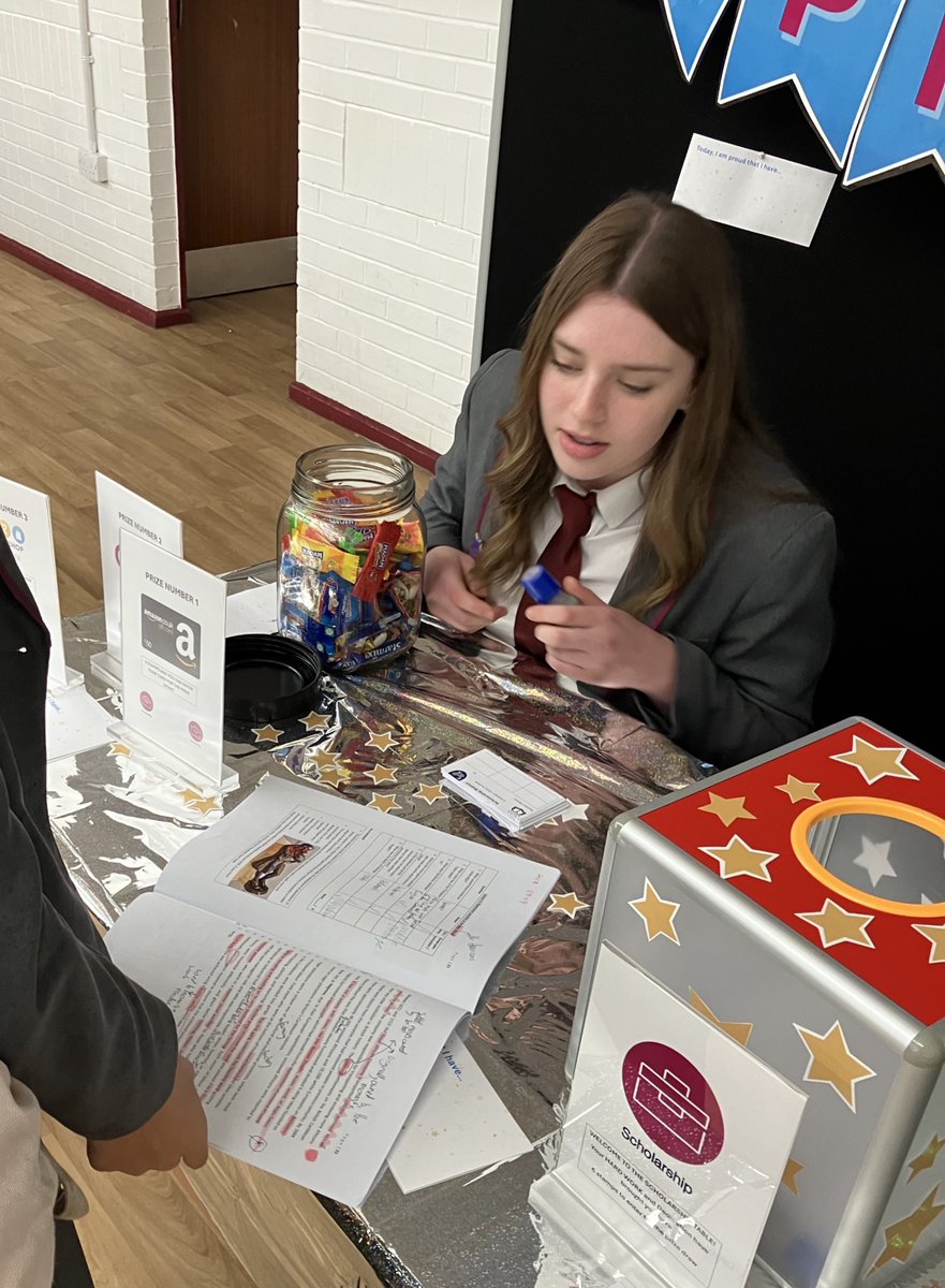 Beautifully yr7  highlighted, annotated and green peened scholar work at the <a href="/AstreaErnulf/">Astrea Ernulf</a> Scholarship Table today. That deserves a reward and a stamp towards the big prize draw! Deputy Head Scholar Holly, running the table, looks impressed. #FGF