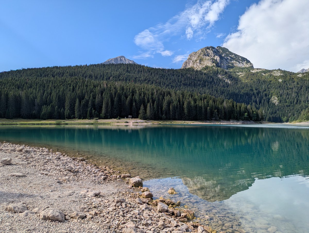 Another lake nestled at the foot of mountains.
#montenegro  #mytravelpics