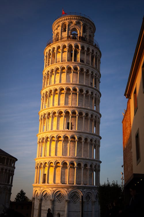 The_Silent_View's tweet photo. As the sun sets over Pisa 🌅, the Leaning Tower glimmers in soft golden light. Its elegant marble leans gently toward the fading sky, while the square grows quiet and shadows stretch across the stones. ✨

#LeaningTower #PisaSunset #GoldenHour #TimelessBeauty #ItalyMagic https://t.co/MnPCjiBSn7