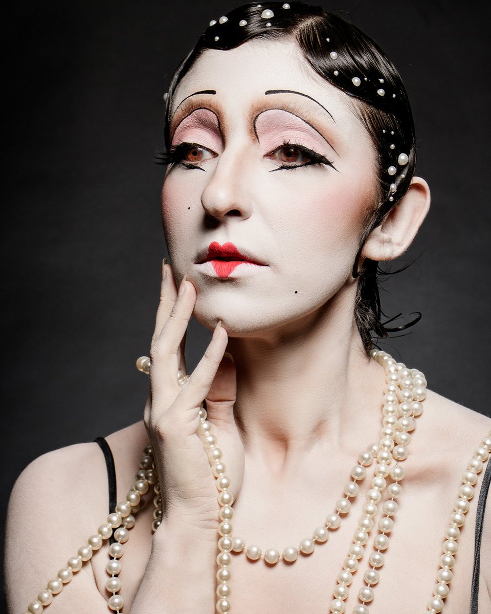 Vintage glamour, reimagined. This bold look channels the drama and elegance of 1920s cabaret with sharp lines, pearl embellishments, and expressive eyes. 🎭✨

Theatre Makeup by CMU Student, River Staple Allen