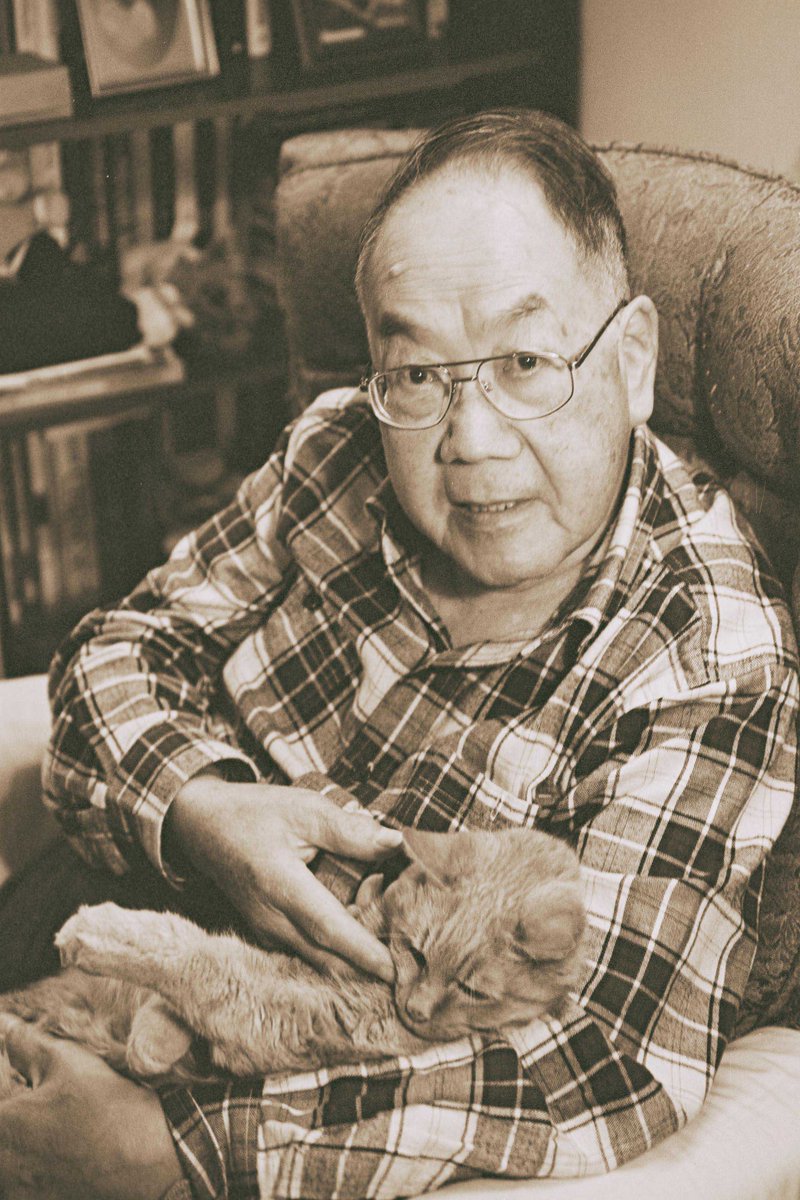 Photograph of William Ling and his cat Morris. 
 
From the Chinese Canadian Stories Collection.
 
DOI: dx.doi.org/10.14288/1.036…