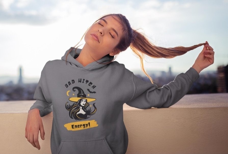 Embrace the enchanting and humorous side of Halloween with our "Bad Witch Energy" t-shirt.

Available in multiple colors and hoodies

Can also be put on other style tops like long sleeves, crop tops, etc. Just contact me 😊

uneekshops.etsy.com/listing/153353…