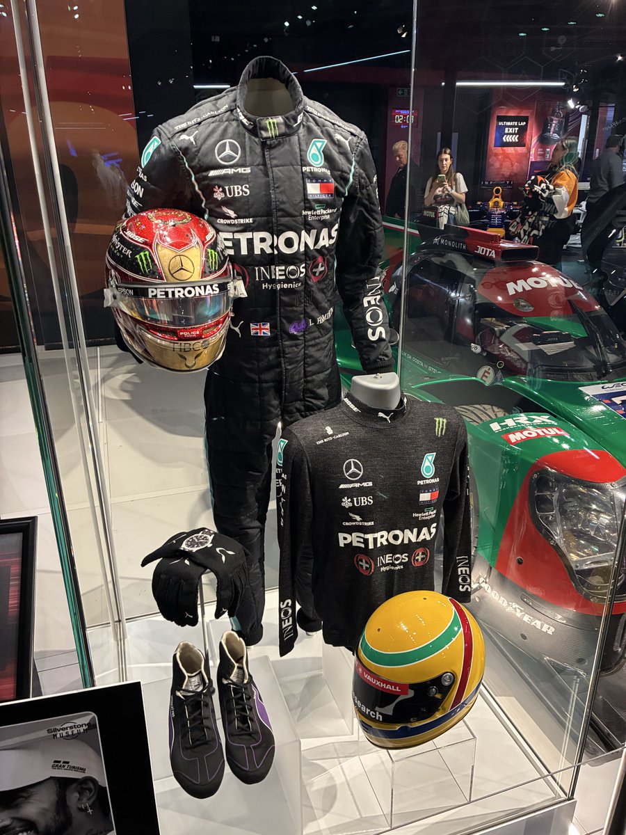 Some F1 Drivers signature’s, another Le Mans car and Sir Lewis’s helmet and racing suit.