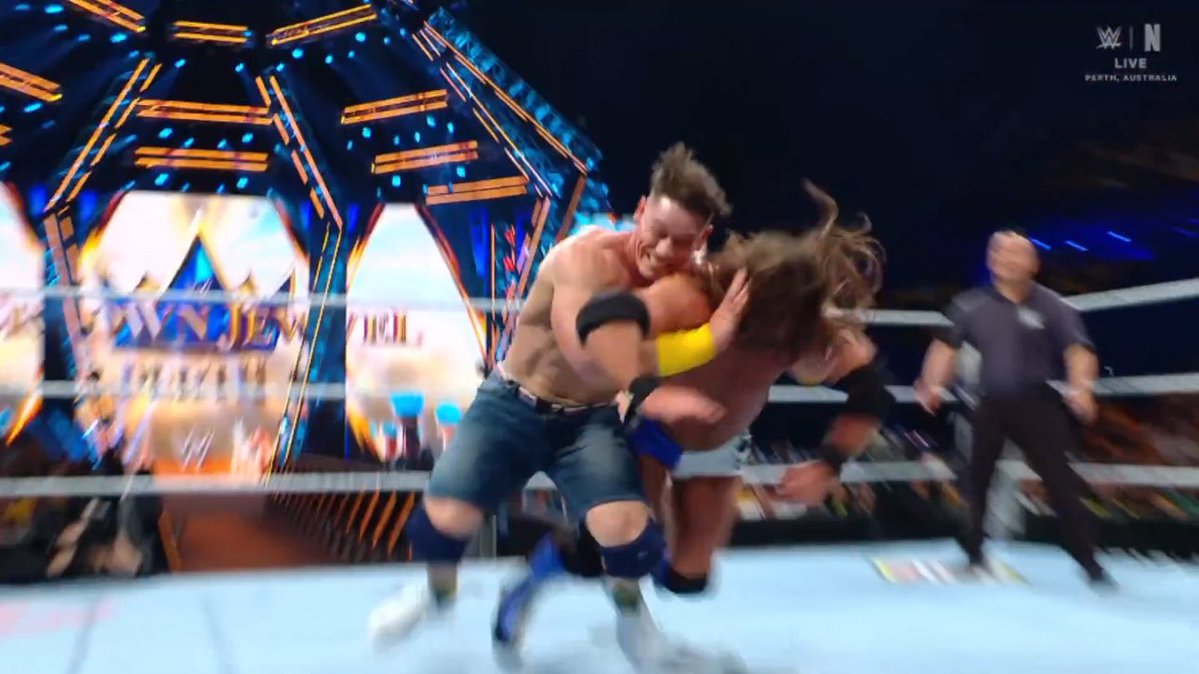 WrestleOps's tweet image. John Cena hits AJ Styles with The Miz’s finisher, the Skull Crushing Finale.

#WWECrownJewel