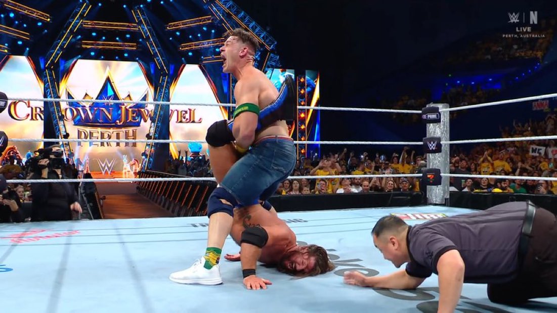 WrestleOps's tweet image. John Cena puts AJ Styles in the Walls of Jericho.

#WWECrownJewel