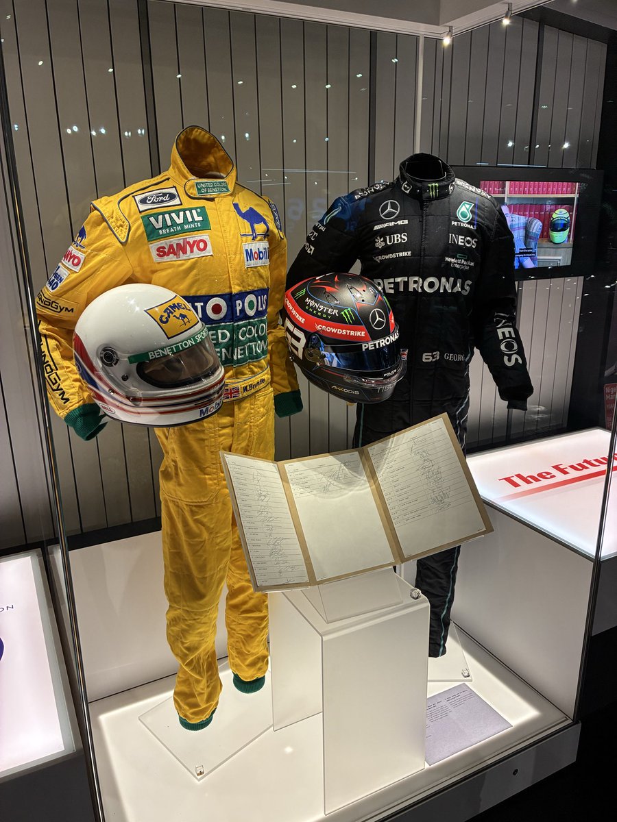 Race helmets of Jackie Stewart, Nigel Mansell, Damon Hill, George Russell.