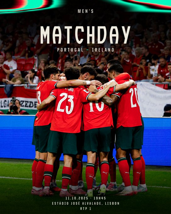 Group of male football players from Portugal national team wearing red jerseys with numbers 23, 10, 25 visible and names like Leao, Fernandes, Silva on backs, green shorts and socks, standing in a huddle with arms around each other on green soccer field, stadium seating with crowd in background, blue sky above, text overlay at top reading MENS MATCHDAY in green and white, PORTUGAL IRELAND below in white, bottom text ESTADIO JOSE ALVALADE LISBOA 11.10.2025 1945 in white.