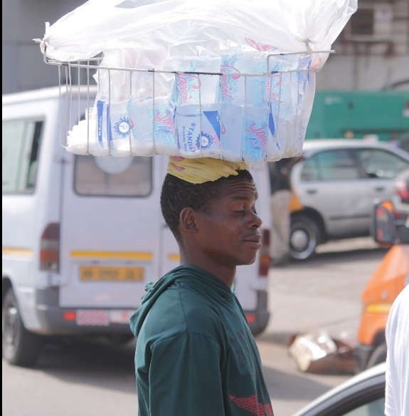 Welcome to Africa 
A hardworking woman              A poor man