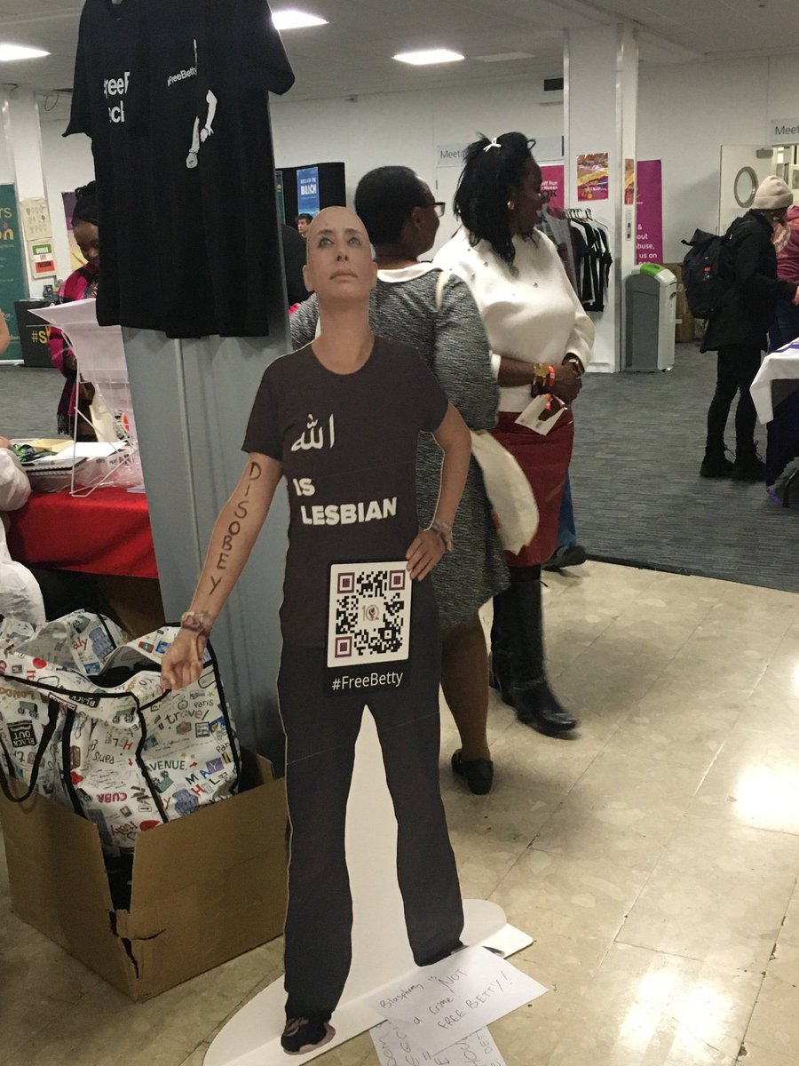 Women_Create_UK's tweet photo. Betty's appearance at #WomenCreate is at #FiLia2025 as a campaign cut out (not ours). She was jailed for 30 months in Morocco for this very shirt. Sadly, we have not been credited again, but all of us want to #FreeBettyLachgar and encourage all to campaign #LiberateLachgar https://t.co/bDSlEyVBQk