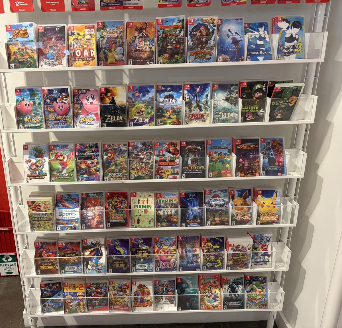Stealth40k's tweet image. Switch game selection at Nintendo NY. 

Before I took this picture, I saw at least 10-15 games grabbed off these shelves for immediate purchase at the counter. 

People are still buying Switch games.