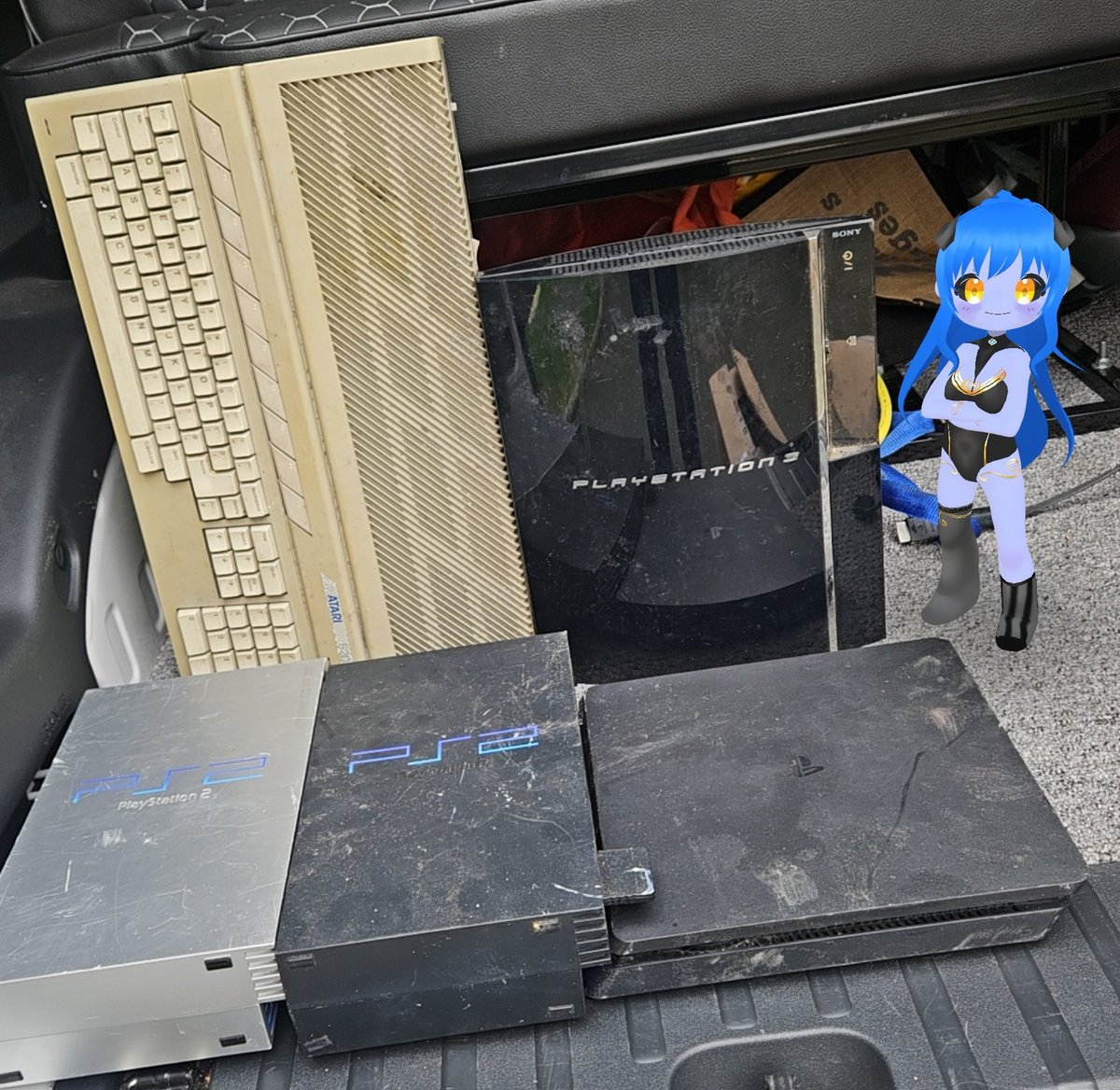 Kyonko_VT's tweet photo. Today I got an interesting #KyonkoFinds with a great variety of PlayStations & something proper retro:
PS2 Black - 2 controllers
PS2 Silver - 1 controller
PS3 60GB backwards compatible
PS4 Slim
&
An Atari 520!
Oh and box load of PS2 games! All saved from the scrapheap! ๐๐ https://t.co/7UGnQ4ms4V