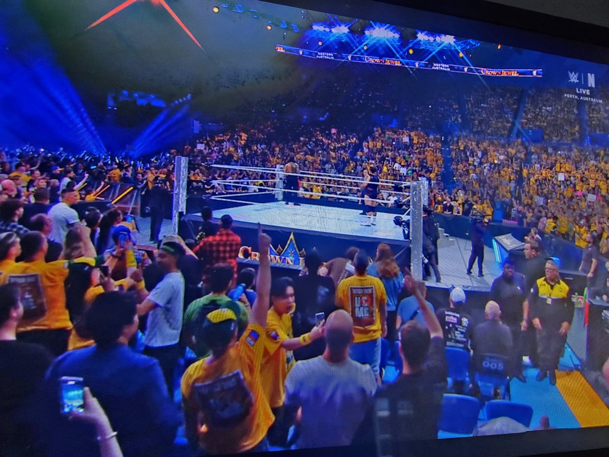 uniqueboyhere's tweet photo. half of the crowd is wearing John Cena's Merch 🫡 #CrownJewel #JohnCena https://t.co/0NUScWNMPi