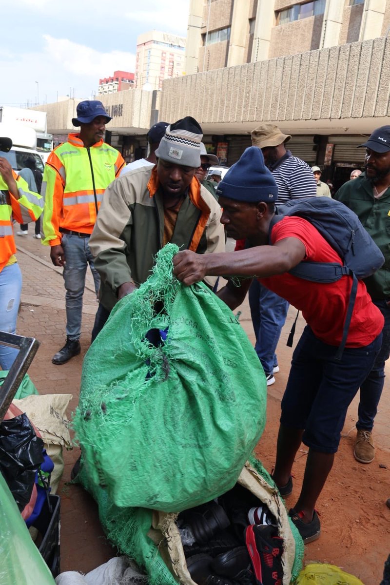 JMPD officers seized goods including counterfeit items from illegal traders who tried to re-occupy the newly cleared De Villiers Street in the Johannesburg CBD.