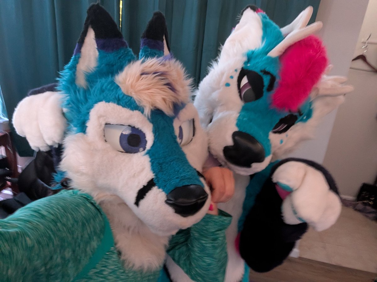 My friend wanted to get in my suit. I thought he was pretty cute in it. :p