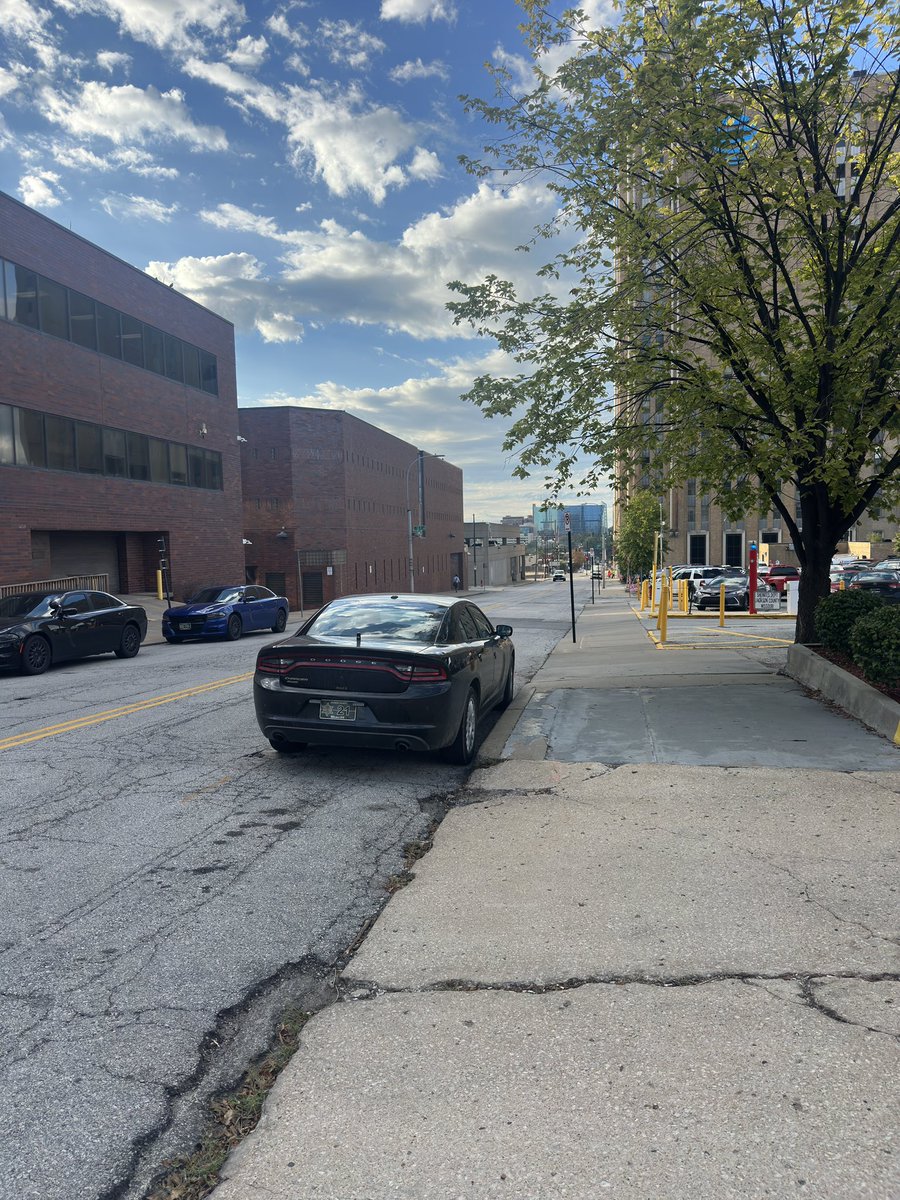 thercc75's tweet photo. @JCSheriffOffice why do your officers continue to break the law and park in a clearly marked no parking zone? I know if I parked there I would be ticketed/towed and or both.  They’re blocking traffic. No one is above the law.  Thanks for addressing this issue! https://t.co/2iKOGp939C