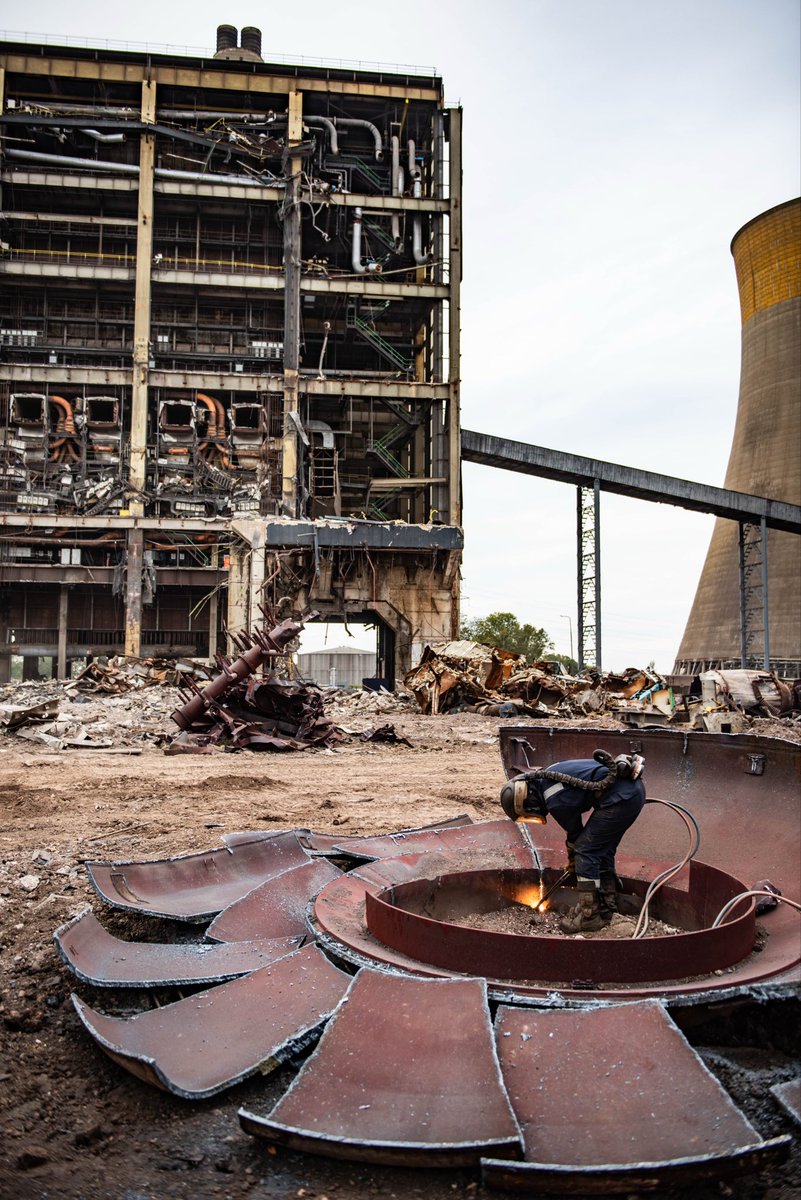 Stunning scenes from a demolition site.

You just have to admire the perfect cross section of a boiler house in the background, left following the explosive demolition of its adjoining deaerator bay.