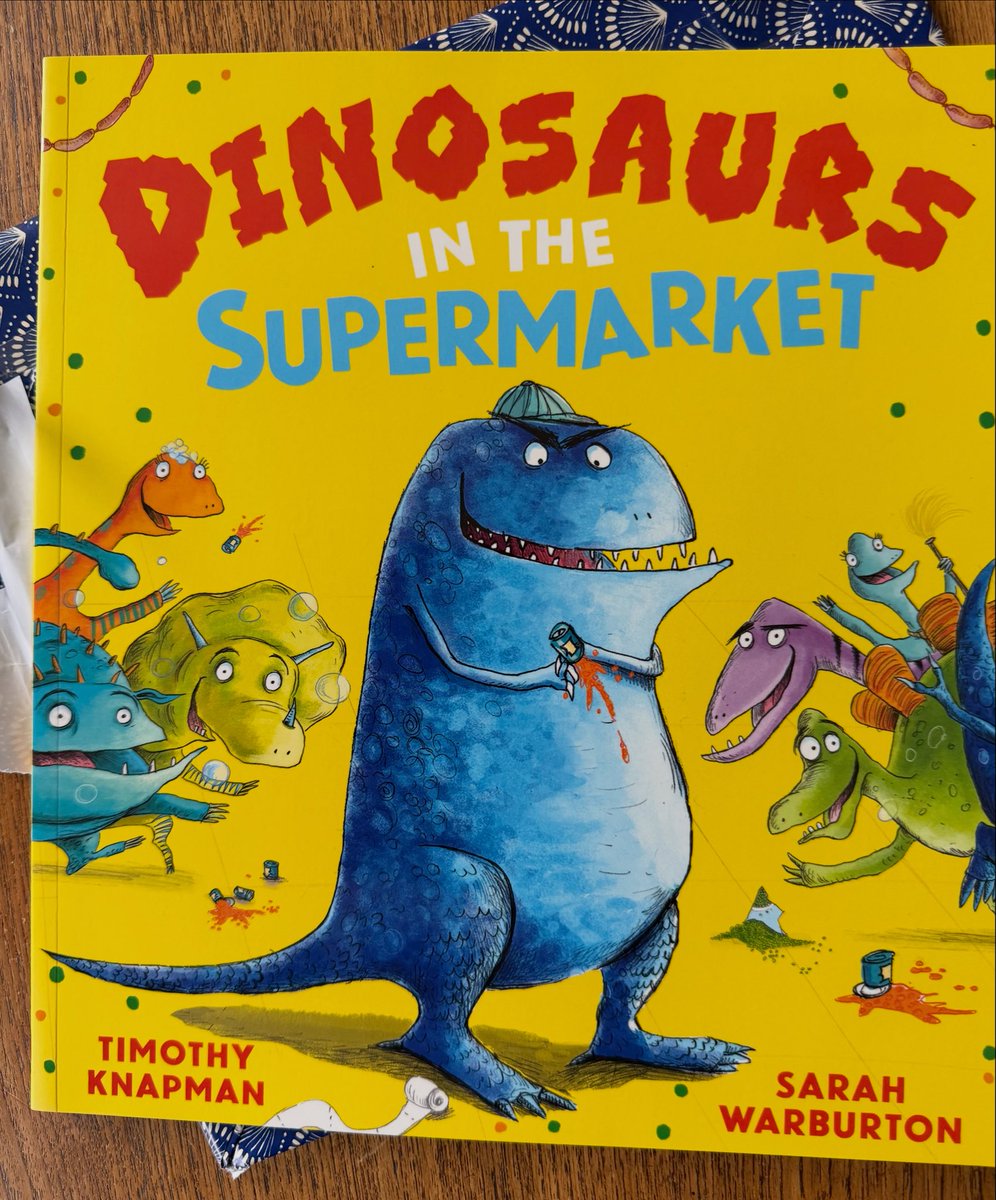Well this is a turn up for the (picture) books. DINOSAURS IN THE SUPERMARKET by me and <a href="/SarahWarbie/">Sarah Warburton</a> is being republished by <a href="/scholasticuk/">Scholastic UK</a> next January. Here’s a sneak peek of the eye-catching new cover. How many naughty dinosaurs will you spot?