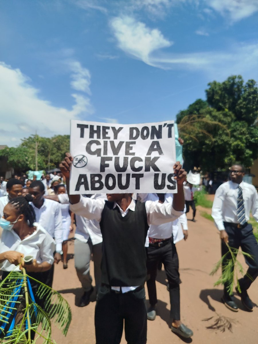 ZikoraCFC's tweet image. Medical students of UNEC protesting against the newly implented "Development levy".
We've been deprived the rights to write our examinations because the university wants each student to pay 30k for no valid reason.
It's Daylight robbery!