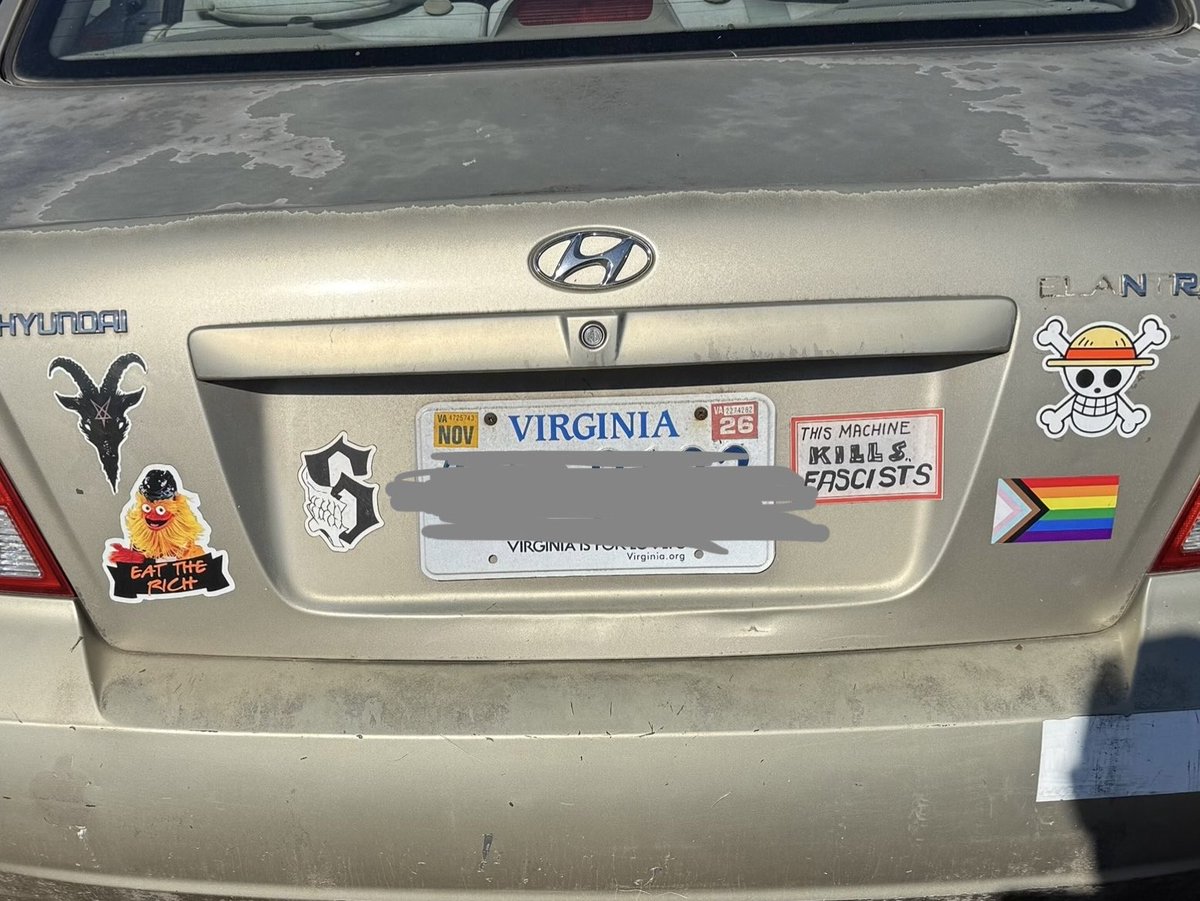 Spotted this today: A trans pride flag and “this machine kills fascists” next to a Satan symbol (left). That tells you all you need to know. These people are genuinely evil.