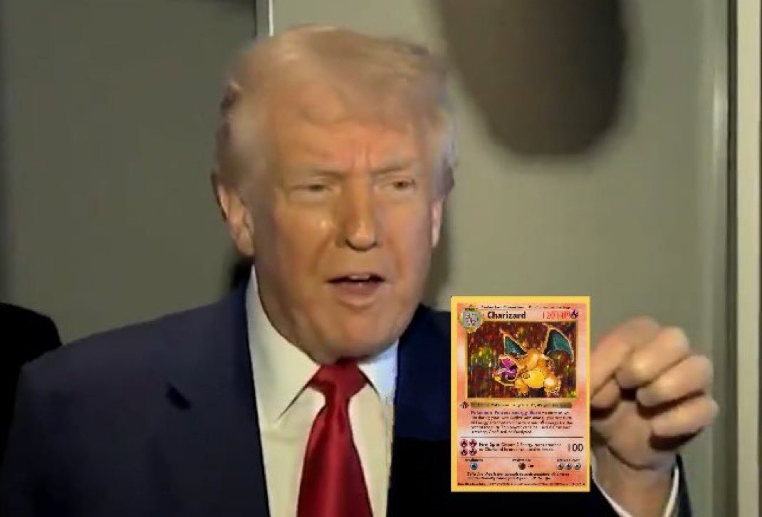 Donald Trump holding a rare Charizard Pokémon card, symbolizing diversification into tangible assets