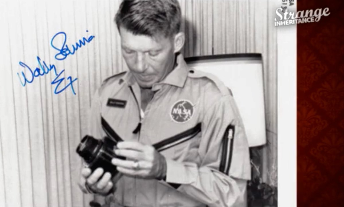 Where is Schirra’s Mercury Σ7 Hasselblad, the first to fly in space?

Is it the camera sold at auction for $275K and featured in the TV show Strange Inheritance? Or is it the camera in my office, that I  bought from Schirra via another collector?

Cole Rise's Space Camera Co. has