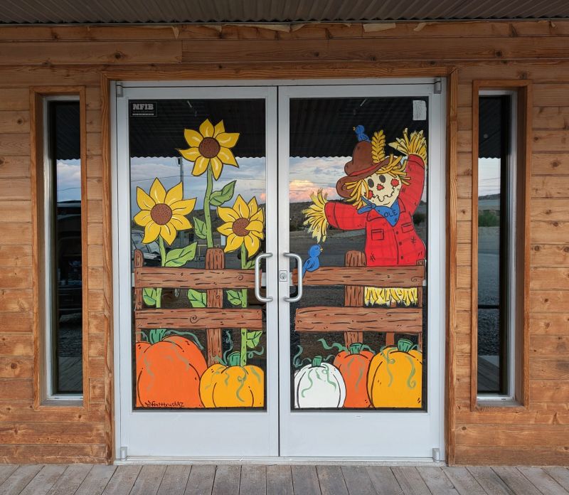 OpenLoopEnergy's tweet image. Fall has officially landed in the Gila Valley 🍂 Our own Kristin Flatt hand-painted this fall scene, turning OLE’s front doors into a storybook entrance. 🍁✨ If you think she nailed it, tap ❤️ let her know she crushed it! #OpenLoopEnergy #TeamOLE #FallVibes